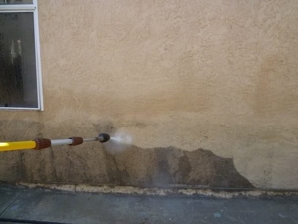 pressure washing residential wall